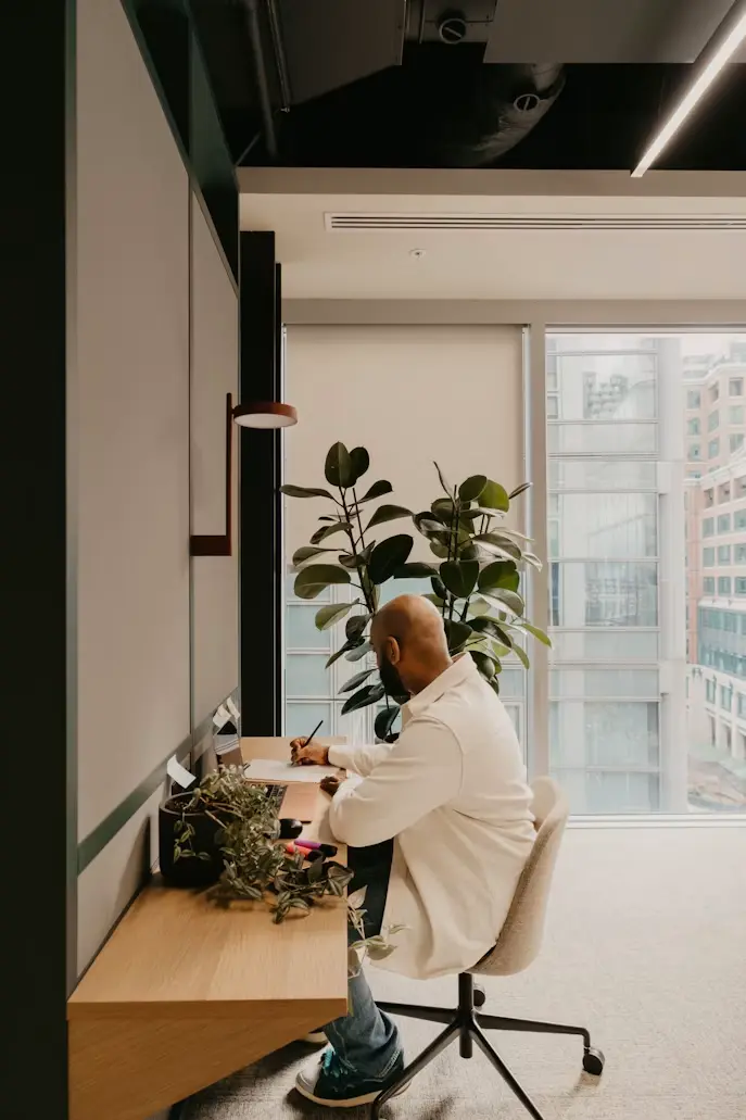 Business owner working at a desk in a modern office